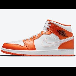 Jordan AJ 1 Mid SE orange and white shoes
